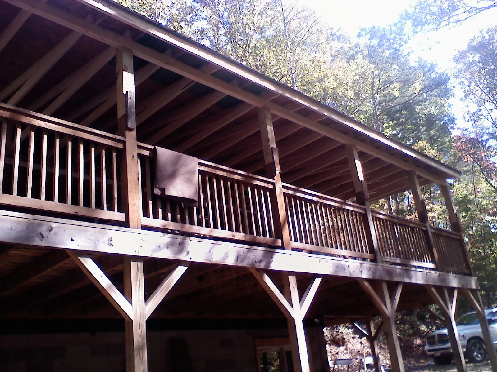 Timber framing under a new elevated porch and deck — Roof Leak Repair in Paisley by Roofing Brothers